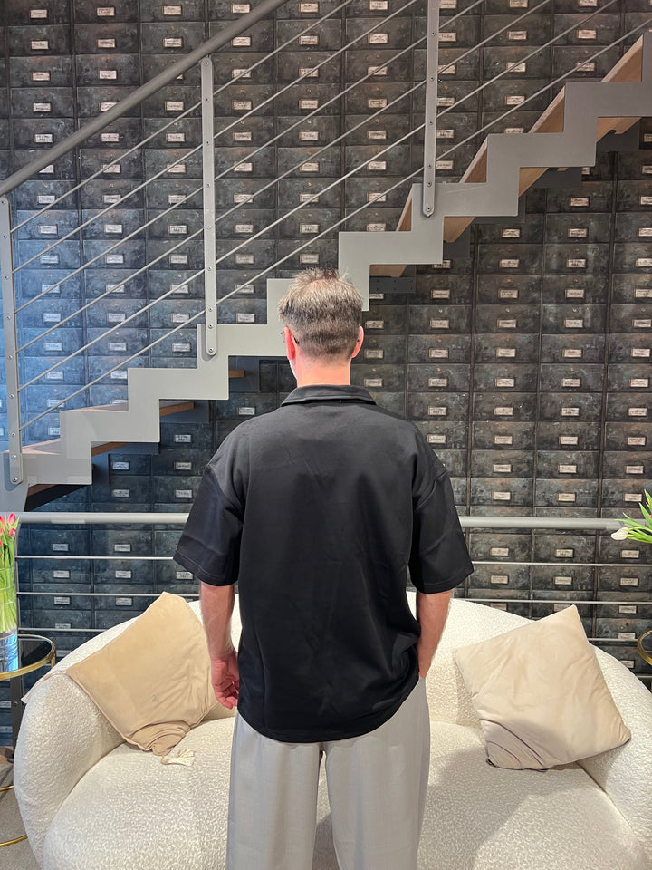 POLO ZIP NERO