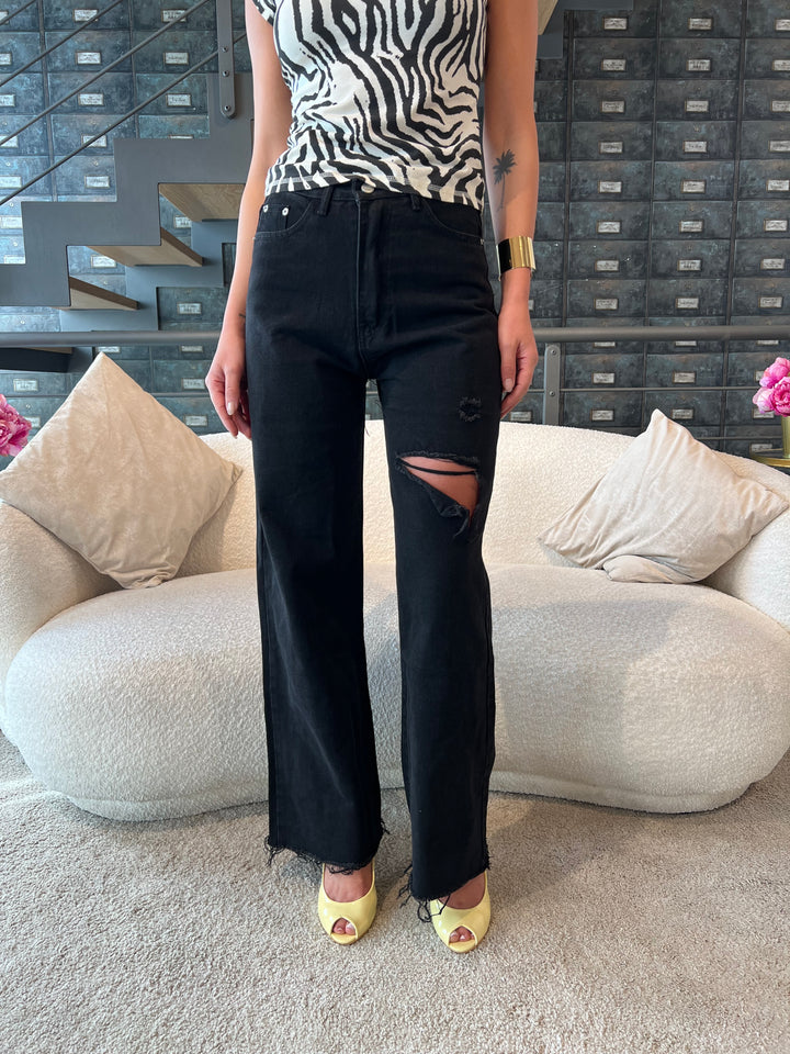 JEANS NERO STRAPPI