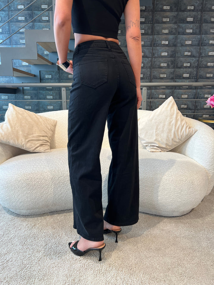 JEANS NERO SVASATO